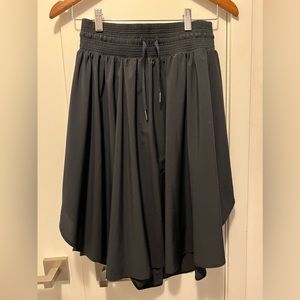 Lululemon black high waisted flowy skirt. Knee length. Size 4